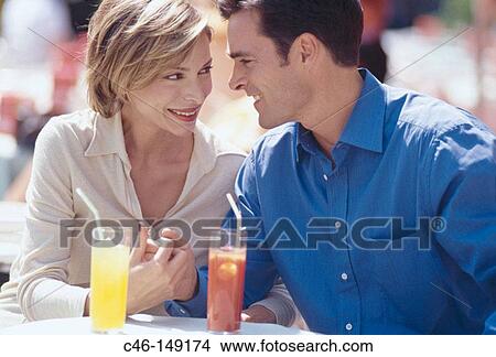Couple at bar View Large Photo Image Picture - Couple at bar. Fotosearch