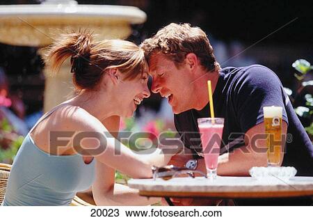 Couple at bar View Large Photo Image Stock Image - Couple at bar. Fotosearch