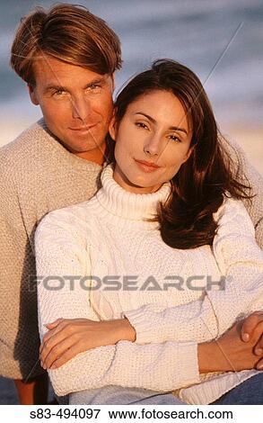 Couple at beach View Large Photo Image Stock Photo - Couple at beach. Fotosearch