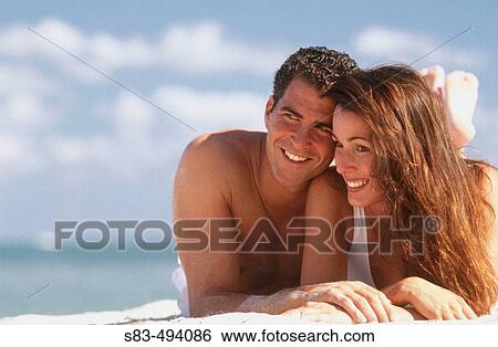 Couple at beach View Large Photo Image Stock Photograph - Couple at beach. Fotosearch