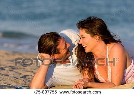 Couple at beach View Large Photo Image Stock Photography - Couple at beach. Fotosearch