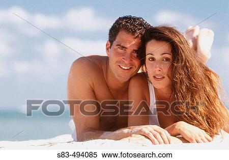 Couple at beach View Large Photo Image Stock Photography - Couple at beach. Fotosearch