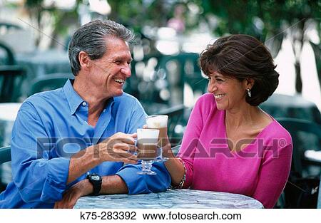 couple at cafe toasting View Large Photo Image Stock Image - couple at cafe toasting. Fotosearch