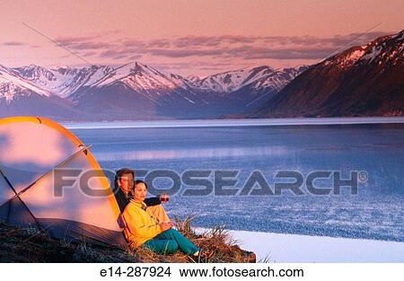 Couple at camp above Turnagain Arm. Chugach State Park. Alaska View Large Photo Image Picture - Couple at camp above Turnagain Arm. Chugach State Park. Alaska. Fotosearch