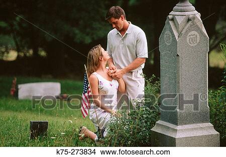 couple at cemetery View Large Photo Image Picture - couple at cemetery. Fotosearch
