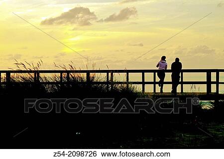 Couple at El Espartal dune, Asturias Spain. View Large Photo Image Stock Photograph - Couple at El Espartal dune, Asturias Spain.. Fotosearch