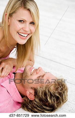Couple at home happy View Large Photo Image Stock Photo - Couple at home happy. Fotosearch