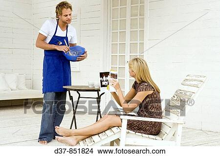 Couple at home View Large Photo Image Picture - Couple at home. Fotosearch