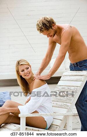 Couple at home relaxing View Large Photo Image Picture - Couple at home relaxing. Fotosearch