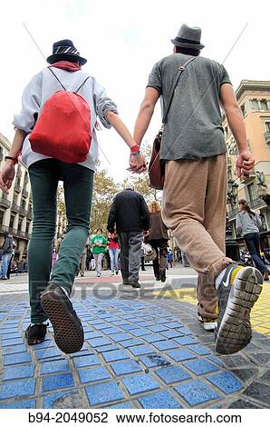 Stock Image - Couple at La Rambla, Barcelona, Catalonia, Spain. Fotosearch