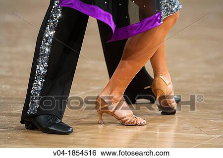 Couple at latin dancing at a dancing competition, Germany, Europe View Large Photo Image Stock Photograph - Couple at latin dancing at a dancing competition, Germany, Europe. Fotosearch