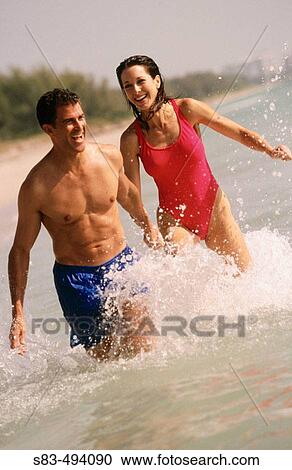 Couple at ocean View Large Photo Image Stock Image - Couple at ocean. Fotosearch