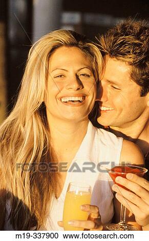 Stock Image - Couple at outdoor caf?. Fotosearch