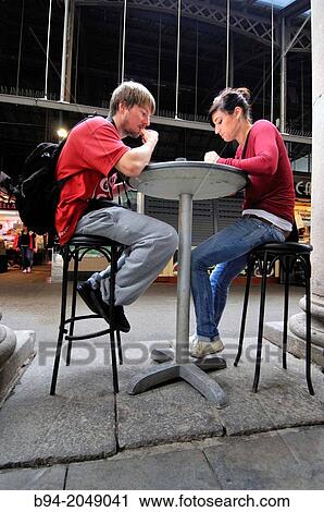 Stock Image - Couple at Sant Josep (aka La Boqueria) market, Barcelona, Catalonia, Spain. Fotosearch