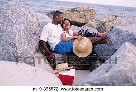 couple at the beach View Large Photo Image Stock Image - couple at the beach. Fotosearch