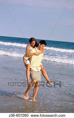 Stock Image - Couple at the beach. Fotosearch