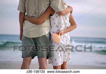 Stock Photography - Couple at the beach. Fotosearch