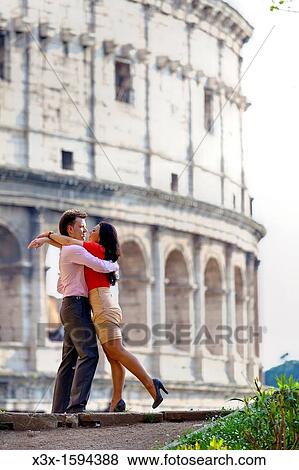 Couple at the Roman Coliseum Rome Italy View Large Photo Image Stock Photo - Couple at the Roman Coliseum Rome Italy. Fotosearch
