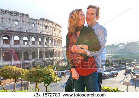 Couple at the roman Colosseum Rome Italy View Large Photo Image Stock Image - Couple at the roman Colosseum Rome Italy. Fotosearch