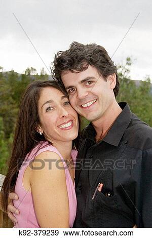 Couple at their wedding rehearsal dinner View Large Photo Image Stock Photo - Couple at their wedding rehearsal dinner. Fotosearch