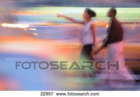 Stock Photo - Couple at Times Square. New York City. USA. Fotosearch