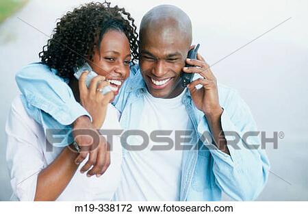 couple both on cellulars View Large Photo Image Stock Image - couple both on cellulars. Fotosearch