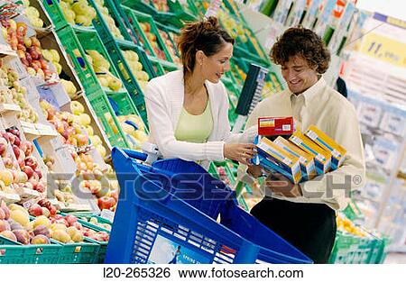 Couple buying food View Large Photo Image Stock Photograph - Couple buying food. Fotosearch