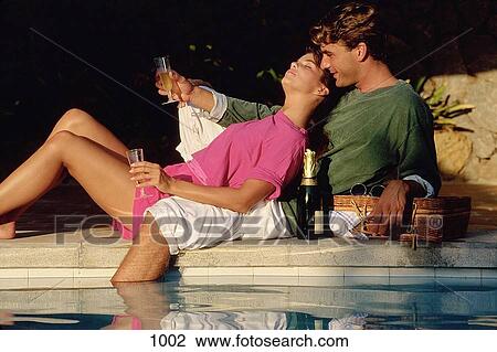 Couple by the pool View Large Photo Image Stock Image - Couple by the pool. Fotosearch