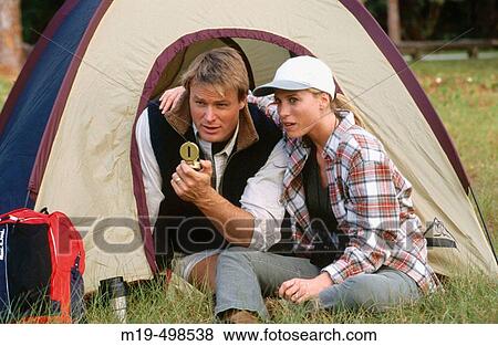 Stock Photo - couple camping. Fotosearch