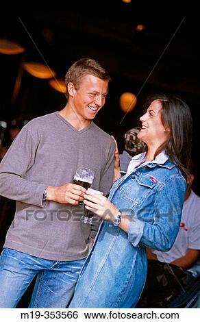 Stock Photograph - Couple Chatting. Fotosearch
