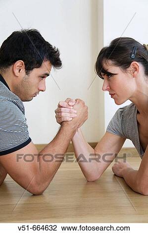 Couple competing View Large Photo Image Stock Image - Couple competing. Fotosearch