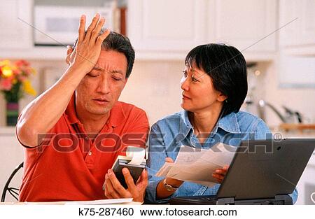 couple concerned about their finances View Large Photo Image Stock Image - couple concerned about their finances. Fotosearch