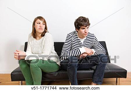 Picture - Couple conflict at home. Fotosearch