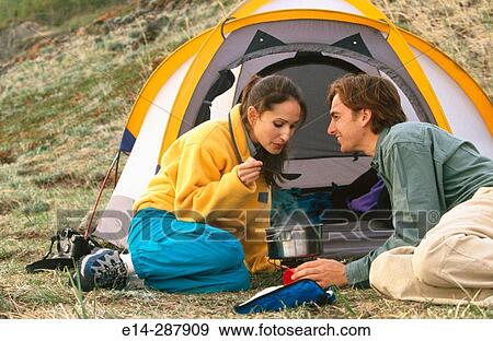 Couple cooking meal by tent. Chugach State Park. Southcentral Alaska View Large Photo Image Stock Photo - Couple cooking meal by tent. Chugach State Park. Southcentral Alaska. Fotosearch