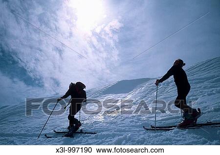Couple cross country skiing, rear view Pyrenees Lles Catalonia Spain View Large Photo Image Stock Image - Couple cross country skiing, rear view Pyrenees Lles Catalonia Spain. Fotosearch