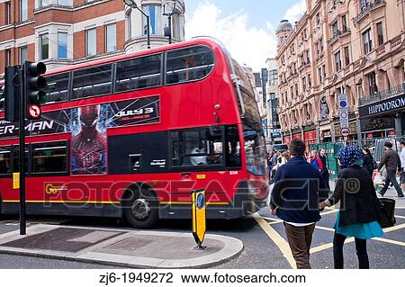 Couple crossing the street. London England. View Large Photo Image Stock Image - Couple crossing the street. London England.. Fotosearch