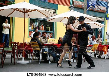 Couple dancing tango at La Boca district Buenos Aires, Argentina View Large Photo Image Stock Photo - Couple dancing tango at La Boca district Buenos Aires, Argentina. Fotosearch