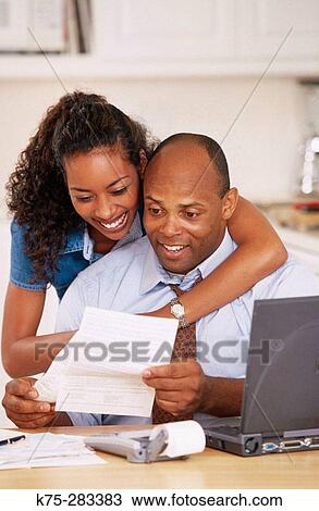 couple doing home finances View Large Photo Image Stock Image - couple doing home finances. Fotosearch