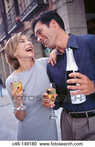 Couple drinking champagne View Large Photo Image Stock Image - Couple drinking champagne. Fotosearch