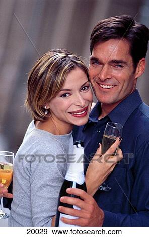 Stock Photo - Couple drinking champagne. Fotosearch