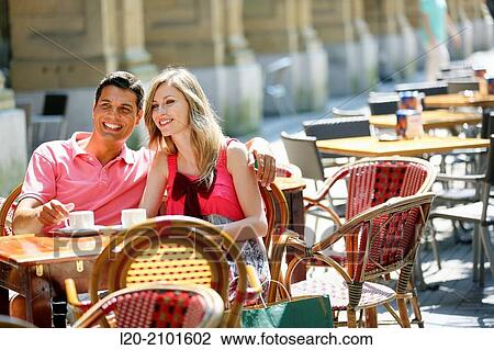 Couple drinking coffee on a terrace. San Sebastian. Donostia. Gipuzkoa. Basque Country. Spain. View Large Photo Image Stock Image - Couple drinking coffee on a terrace. San Sebastian. Donostia. Gipuzkoa. Basque Country. Spain.. Fotosearch