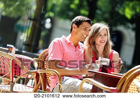 Couple drinking coffee on a terrace. San Sebastian. Donostia. Gipuzkoa. Basque Country. Spain. View Large Photo Image Stock Image - Couple drinking coffee on a terrace. San Sebastian. Donostia. Gipuzkoa. Basque Country. Spain.. Fotosearch