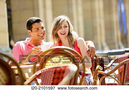 Couple drinking coffee on a terrace. San Sebastian. Donostia. Gipuzkoa. Basque Country. Spain. View Large Photo Image Stock Photo - Couple drinking coffee on a terrace. San Sebastian. Donostia. Gipuzkoa. Basque Country. Spain.. Fotosearch