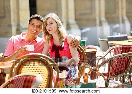 Stock Photo - Couple drinking coffee on a terrace. San Sebastian. Donostia. Gipuzkoa. Basque Country. Spain.. Fotosearch