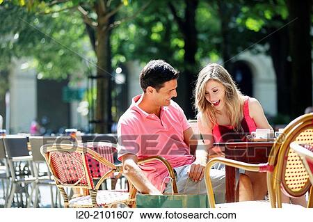 Couple drinking coffee on a terrace. San Sebastian. Donostia. Gipuzkoa. Basque Country. Spain. View Large Photo Image Stock Photo - Couple drinking coffee on a terrace. San Sebastian. Donostia. Gipuzkoa. Basque Country. Spain.. Fotosearch