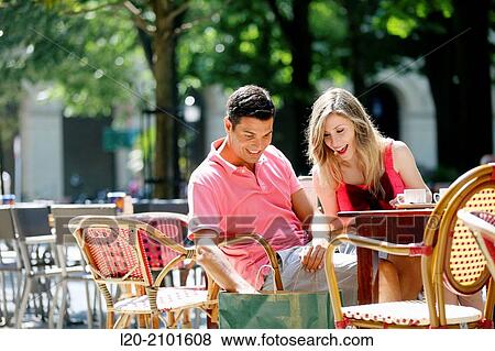 Couple drinking coffee on a terrace. San Sebastian. Donostia. Gipuzkoa. Basque Country. Spain. View Large Photo Image Stock Photo - Couple drinking coffee on a terrace. San Sebastian. Donostia. Gipuzkoa. Basque Country. Spain.. Fotosearch