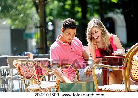 Couple drinking coffee on a terrace. San Sebastian. Donostia. Gipuzkoa. Basque Country. Spain. View Large Photo Image Stock Photo - Couple drinking coffee on a terrace. San Sebastian. Donostia. Gipuzkoa. Basque Country. Spain.. Fotosearch