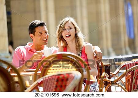 Couple drinking coffee on a terrace. San Sebastian. Donostia. Gipuzkoa. Basque Country. Spain. View Large Photo Image Stock Photograph - Couple drinking coffee on a terrace. San Sebastian. Donostia. Gipuzkoa. Basque Country. Spain.. Fotosearch