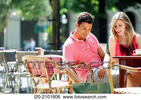 Couple drinking coffee on a terrace. San Sebastian. Donostia. Gipuzkoa. Basque Country. Spain. View Large Photo Image Stock Photograph - Couple drinking coffee on a terrace. San Sebastian. Donostia. Gipuzkoa. Basque Country. Spain.. Fotosearch