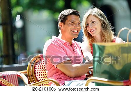 Couple drinking coffee on a terrace. San Sebastian. Donostia. Gipuzkoa. Basque Country. Spain. View Large Photo Image Stock Photography - Couple drinking coffee on a terrace. San Sebastian. Donostia. Gipuzkoa. Basque Country. Spain.. Fotosearch